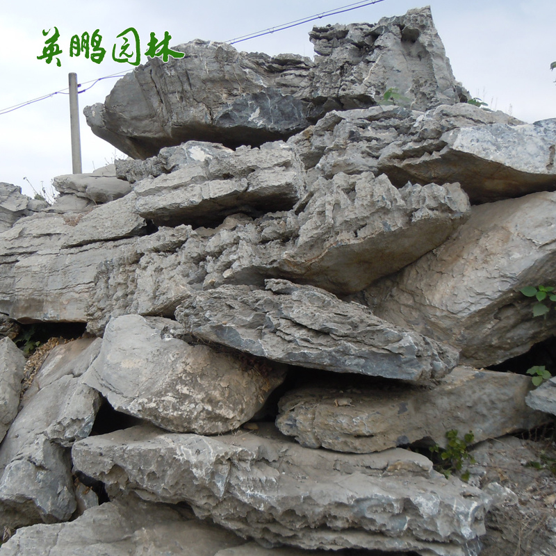 英石峰式疊式公園假山石材批發(fā)基地 庭院造景假山景源頭廠(chǎng)